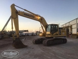 Used Komatsu under setting sun